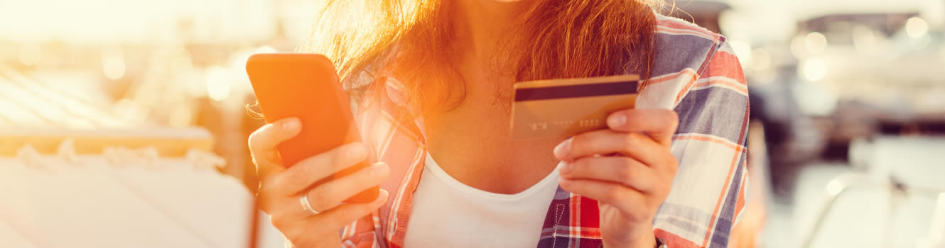 girl with credit card in hand